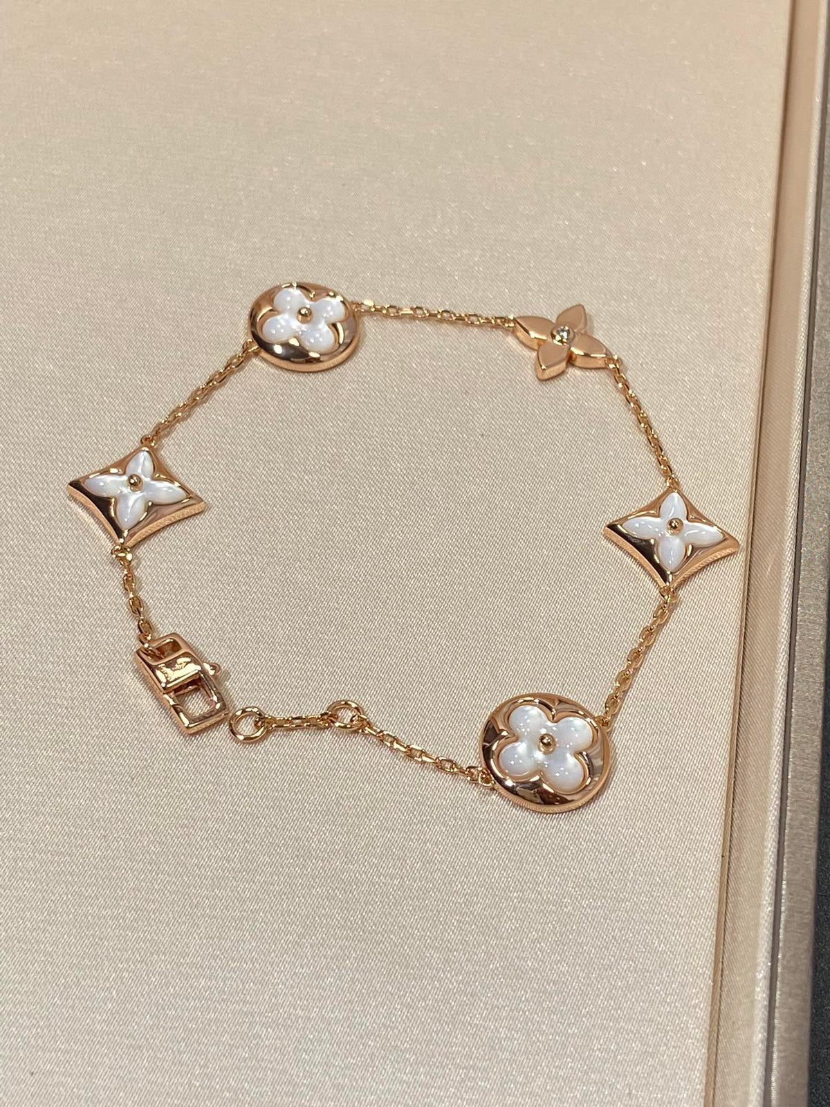 [ECHO ]STAR AND SUN 5 MOTIF MOP PINK GOLD BRACELET