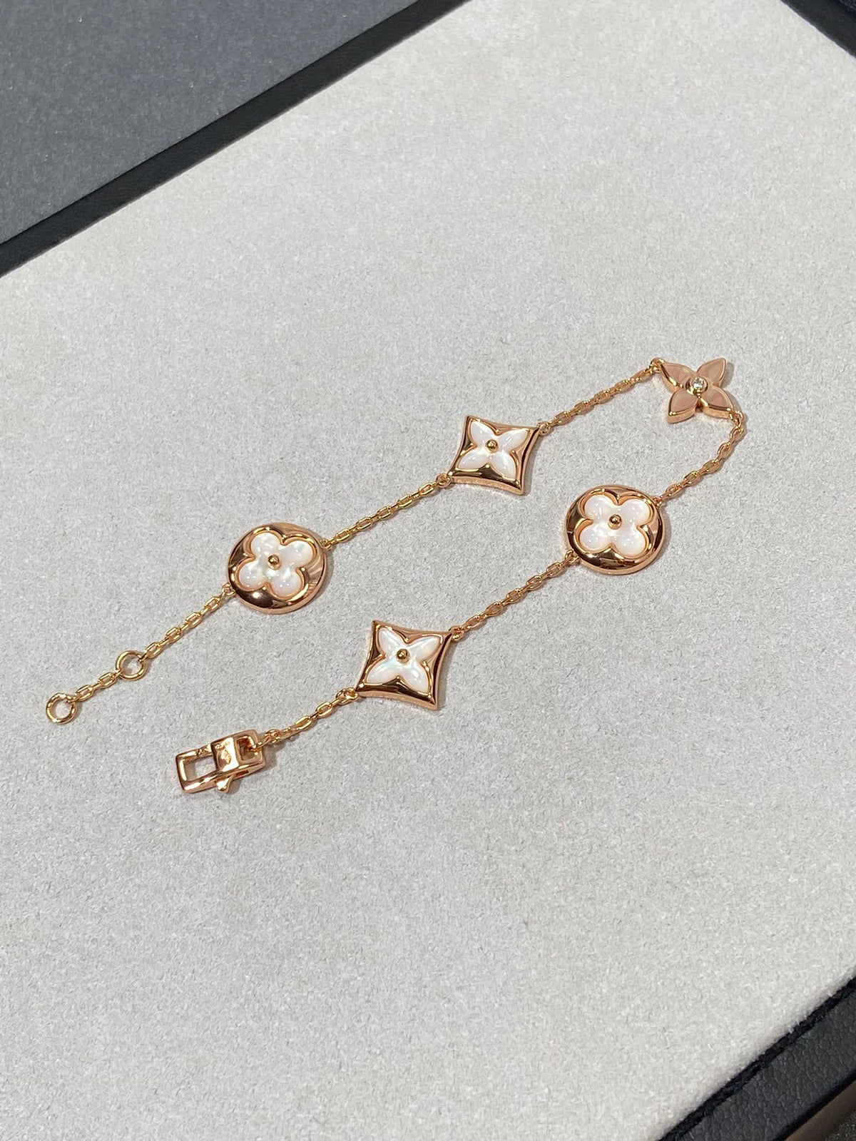 [ECHO ]STAR AND SUN 5 MOTIF MOP PINK GOLD BRACELET